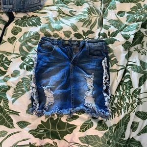 machine denim mini skirt with frayed detailing